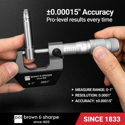 Brown & Sharpe mechanical outside micrometer measuring a workpiece
